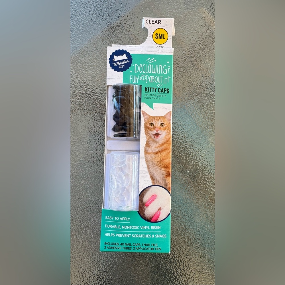 Kitty claw caps. New in Box. No more scratching.